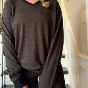 Dark green men’s long sleeve sweater